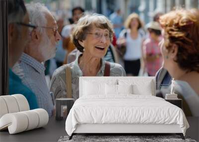 Happy senior woman walking in the street and talking with her friends. Wall mural