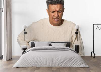 Middle-aged Latino man having a liver pain, stomach ache. Wall mural