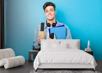 Teenager caucasian man ready to go to school Wall mural