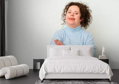 Woman with Down syndrome isolated smiling confident with crossed arms. Wall mural