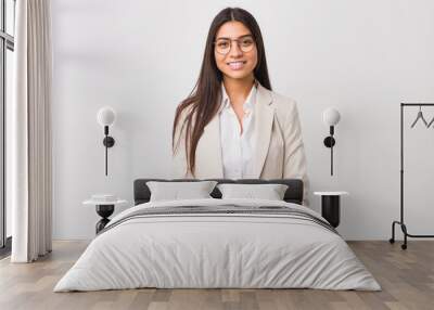 Young business arab woman isolated against a white background happy, smiling and cheerful. Wall mural