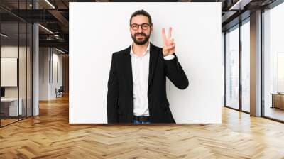 Young caucasian business man isolated on a white background showing number two with fingers. Wall mural