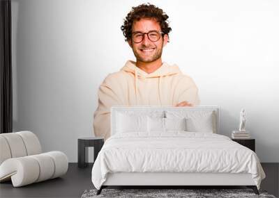 Young caucasian curly hair man isolated Young caucasian man with curly hair isolated laughing and having fun. Wall mural