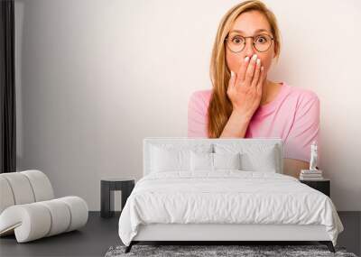 Young caucasian woman isolated on white background pointing to the side Wall mural