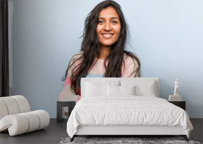 Young fashion indian woman happy, smiling and cheerful. Wall mural