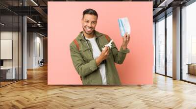 Young filipino man ready to travel Wall mural