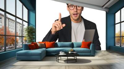 Young Hispanic businessman with laptop having an idea, inspiration concept. Wall mural