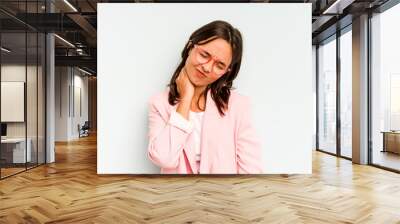 Young hispanic woman isolated on blue background having fun covering half of face with palm. Wall mural