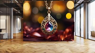 a gold necklace with a gem on it.  Wall mural