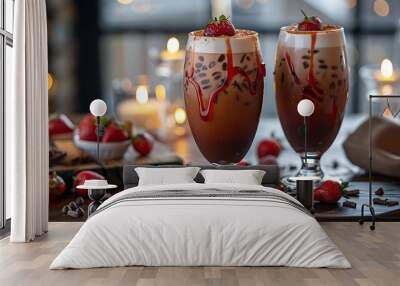 two glasses of chocolate milkshakes with strawberries. Wall mural