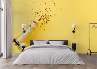 Champagne party concept on a yellow background Wall mural