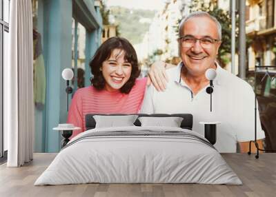 Father and daughter laughing together Wall mural