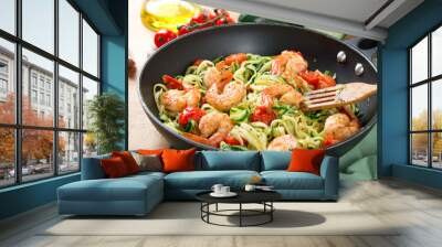 Zucchini noodles sauteed with cherry tomato and prawns in a pan Wall mural