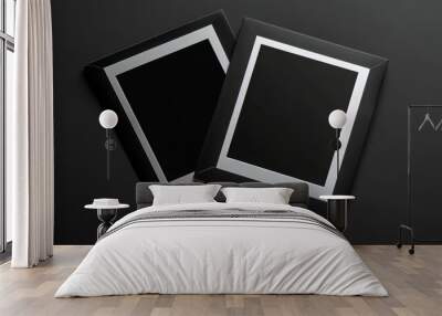 elegant display of two black picture frames on a black background for modern decor and minimalist design Wall mural