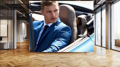 Handsome man in the car, businessman Wall mural