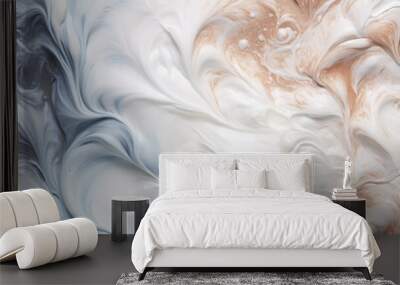 Artistic close-up of creamy white and brown cosmetics texture with swirling marble effect. Wall mural