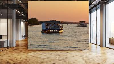 Two safari ships cruising Zambezi river. Victoria Falls, Zimbabwe Africa. Wall mural