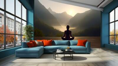 Back view of woman doing yoga on wood lounge with beautiful mountain view, a woman doing yoga exercise in nature. Meditation with view of mountains Wall mural