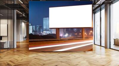 Blank billboard sign on city highway at night, Outdoor advertising banner on the street for advertisement street city. Promotional poster mock up Wall mural