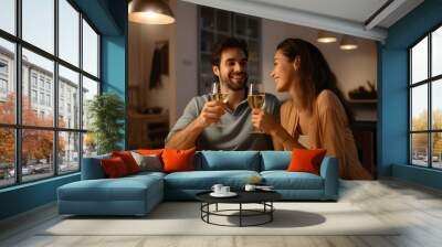 Happy young couple having dinner at home, romantic marriage man and woman celebrating wedding anniversary in kitchen at home Wall mural