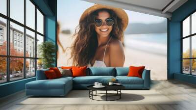 Portrait of attractive young woman in bikini and sunglasses enjoying her summer vacation holiday at the tropical beach Wall mural