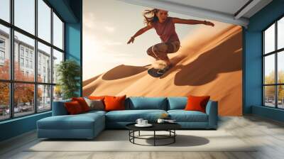 Young woman sandboarding from high dunes, tourist sandboarding in the desert Wall mural