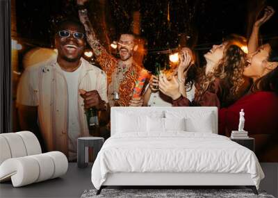 A Group of people has a great time at the rooftop nightclub and throws confetti. Wall mural