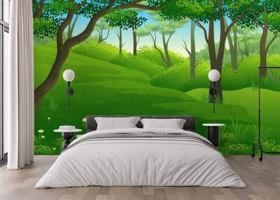 Green grass in the middle of the forest with lush trees Wall mural