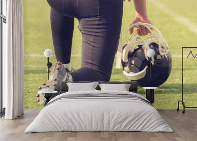 American football player waiting to join the game. Wall mural