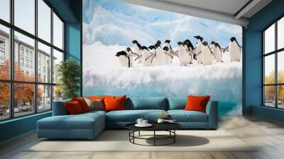 Penguins on the snow Wall mural