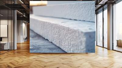 Closeup of a white styrofoam block. This image is perfect for showcasing insulation materials used in construction. Wall mural