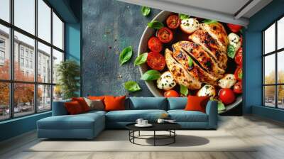 Grilled chicken breast with mozzarella, tomatoes, and basil. This image showcases a healthy and flavorful meal perfect for a blog or advertisement about healthy eating. Wall mural