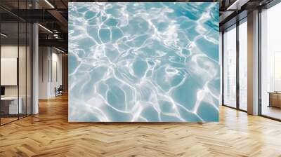 Sparkling blue water with light reflections. Perfect for designs that evoke feelings of summer, relaxation, and tranquility. Wall mural