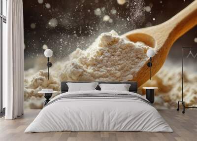 Spoonful of flour being poured. Perfect for showcasing baking, cooking, and food photography. Wall mural