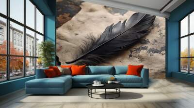 Black feather on old parchment paper, vintage writing concept Wall mural