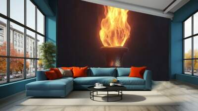 Burning torch isolated on black background, Flame, fire, light, and hope concept Wall mural