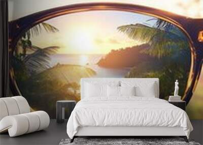 Tropical sunset view through sunglasses, vacation and travel concept Wall mural