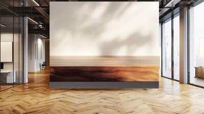 Wooden table top with sunlight and leaf shadows Wall mural