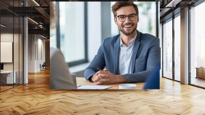 Portrait of young business man smiling in modern office , Happy young man working in coworking space Wall mural