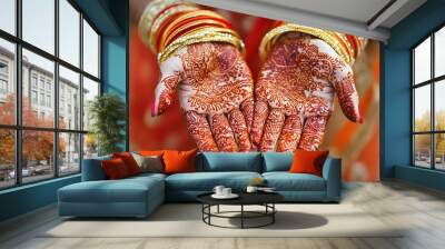 A close-up of a young woman's hands adorned with intricate henna designs and vibrant bangles, showcasing cultural beauty and tradition Wall mural