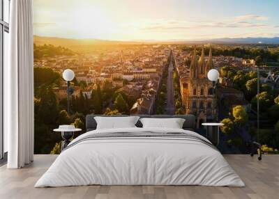 Realistic photo of a historical city center with cathedrals and old town architecture, Landscape Drone view highlighting the charm and history of the area from above Wall mural