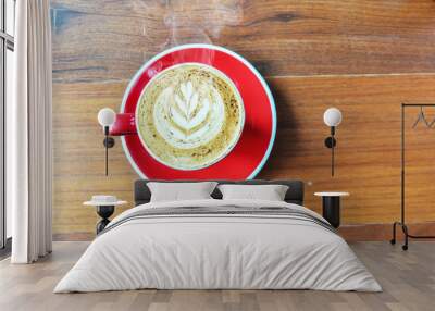 red  cup of hot coffee on wooden table in coffee shop,red cup Wall mural