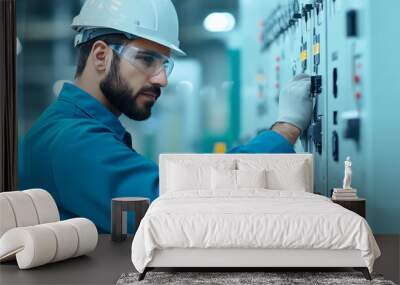 A focused technician adjusting electrical controls in a modern industrial facility, wearing safety gear, ensuring optimal performance of machinery. Wall mural