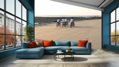 Cycling on the sandy beach of Saint Martins Island, Bangladesh Wall mural