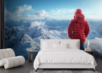 Climber Standing On Mountain Peak With Breathtaking Snowy Landscape Wall mural