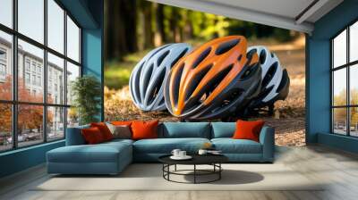 Smart bike helmets on a bright cycling trail background with natural lighting to emphasize safety and style Wall mural