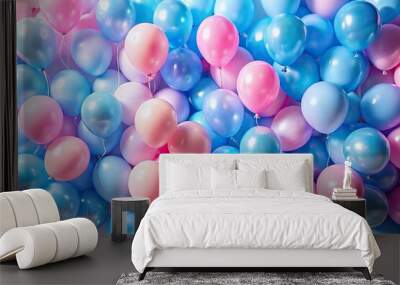 Gender reveal party with blue and pink balloons in the background Wall mural