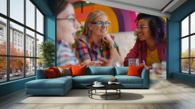 LGBTQ professional discussing marketing plans with the team, modern conference room, diverse group brainstorming, inclusive and creative work environment, collaborative spirit Wall mural