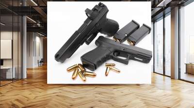 Different size of Semi automatic hand gun and bullets on white background , Comparison of guns Wall mural