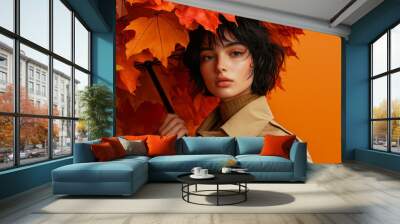 A young girl with an umbrella made of autumn leaves, created with Generative AI technology. Wall mural